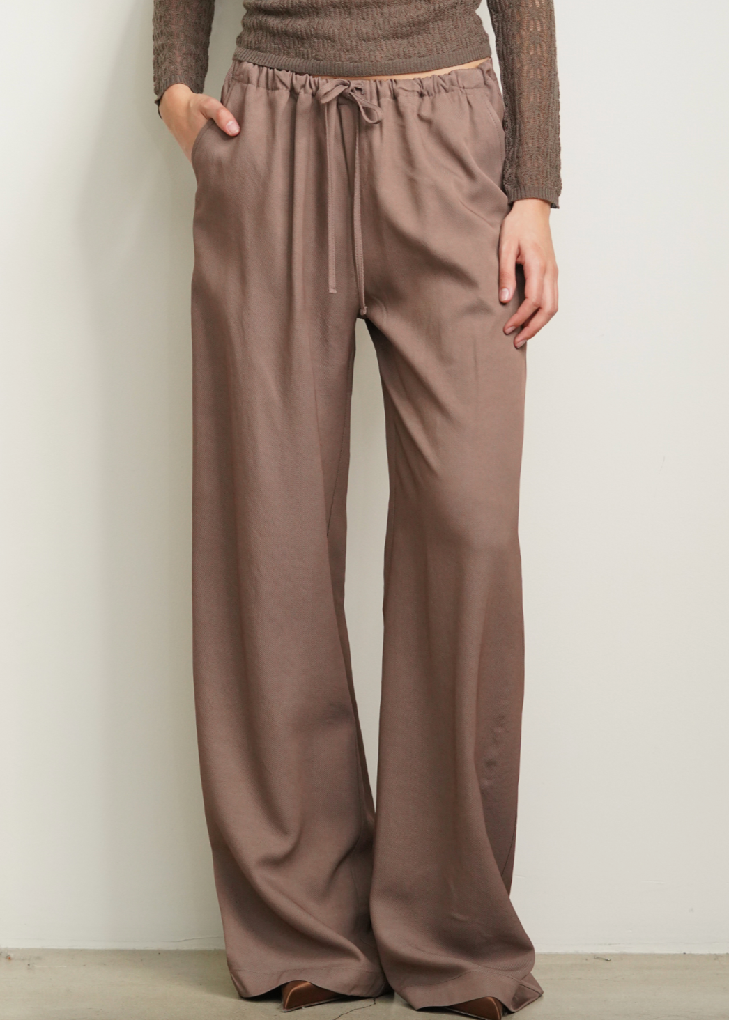 Person wearing Sablyn Gemma Pull On Straight Leg Pant in Swiss Brown