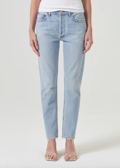 Person wearing AGOLDE Denim Austin Mid-Rise Tapered Slim Jean