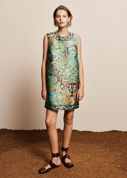 person wearing ALEMAIS womens Charlotte Mini Dress