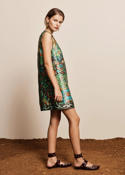 person wearing ALEMAIS womens Charlotte Mini Dress