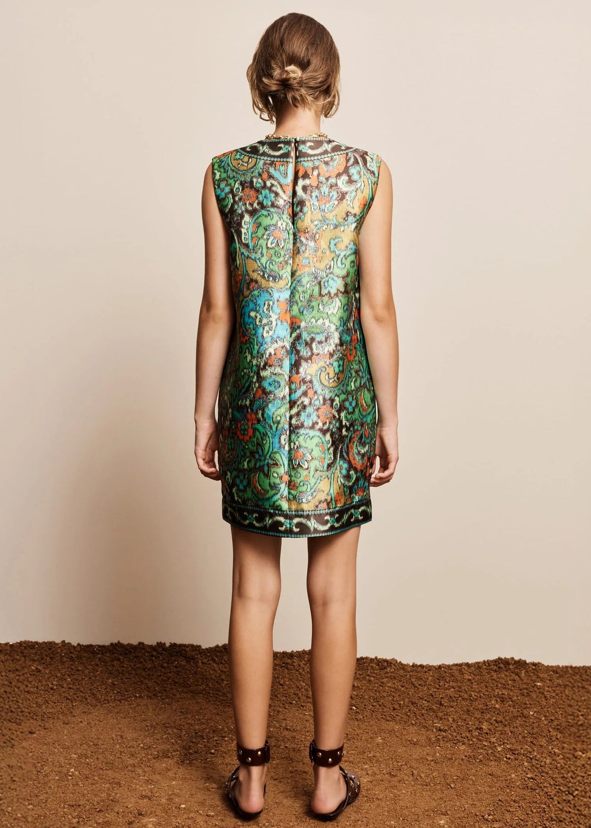 person wearing ALEMAIS womens Charlotte Mini Dress