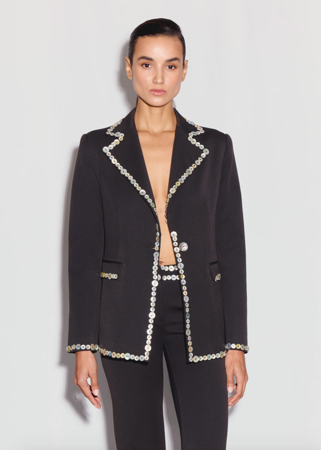 Person wearing ANIM womens Lexa Blazer with shell button details dark brown