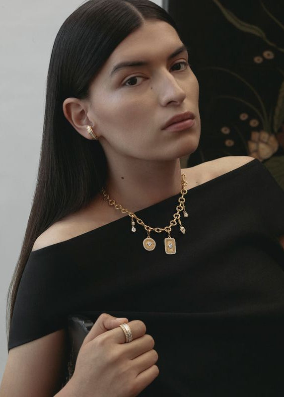 PERSON WEARING AZLEE FINE JEWELRY 18K YELLOW GOLD Elongated Hexagon Medium Pave Diamond Relic Coin