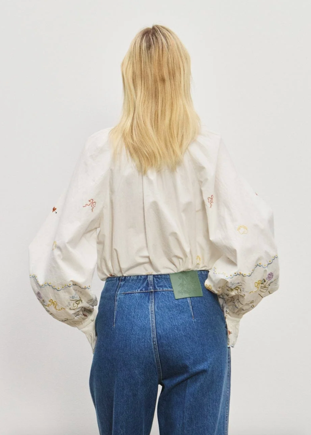 Person wearing Alemais Giulia Embroidered Blouse