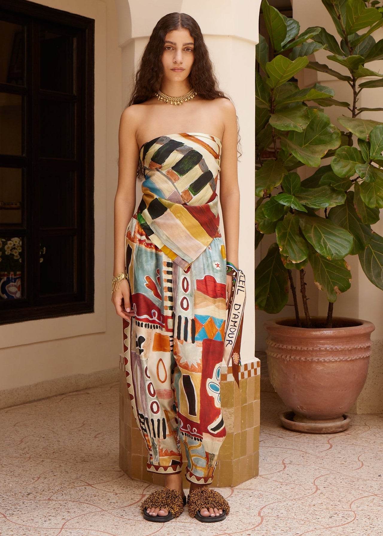 Person wearing Alemais womens Michelle Tapered Silk Pant