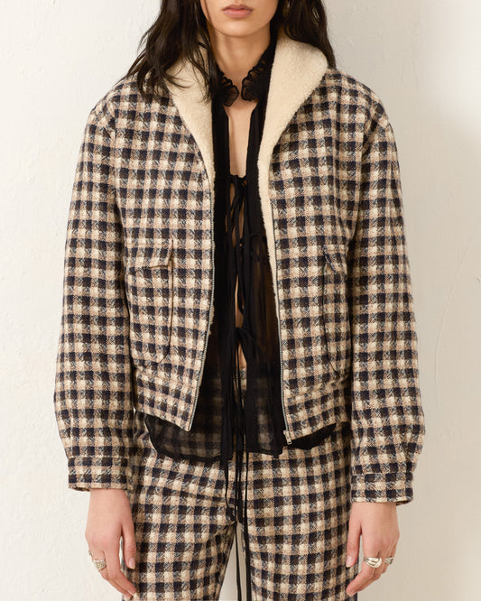 Person wearing Alix of Bohemia Eli Trail Dust Bomber Jacket