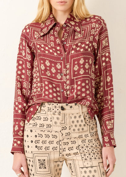 Person wearing Alix of Bohemia FW25-DOL106-Scopy Dolly Saddle Panel Bandana Silk Shirt