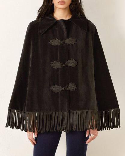 Person wearing Alix of Bohemia FW25-KEN147-JKensingtonOnyxFringeCape0786