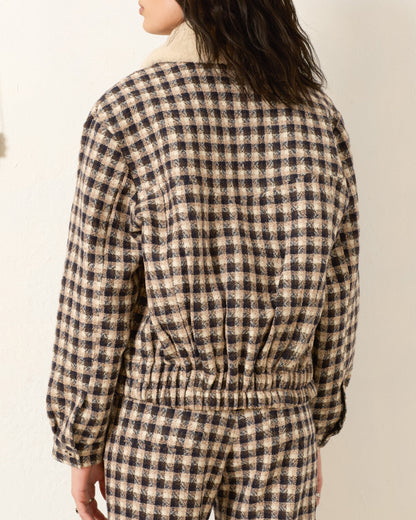 Person wearing Alix of Bohemia FW25 EliTrailDustBomberJacket