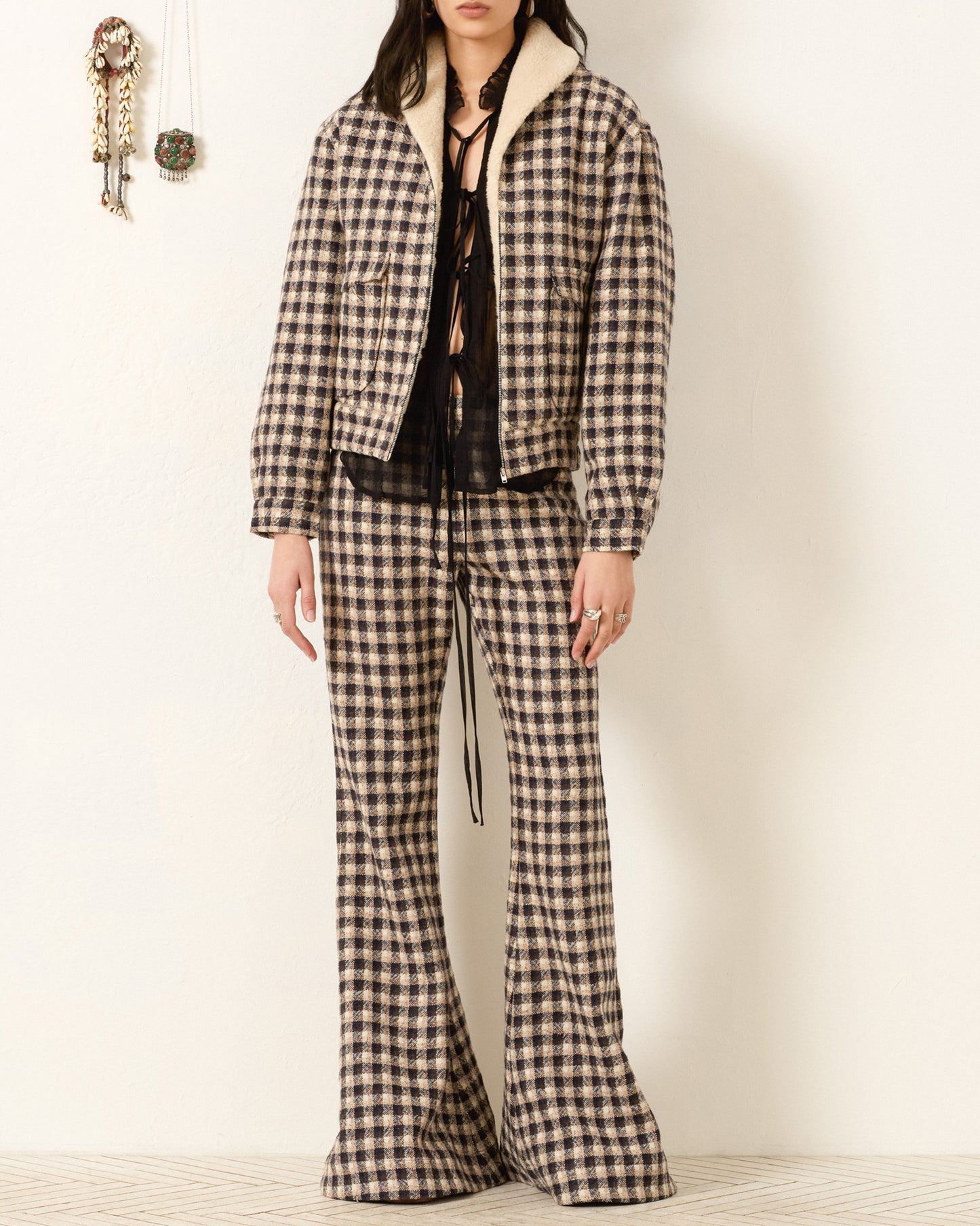 Person wearing Alix of Bohemia FW25 EliTrailDustBomberJacket and Pants