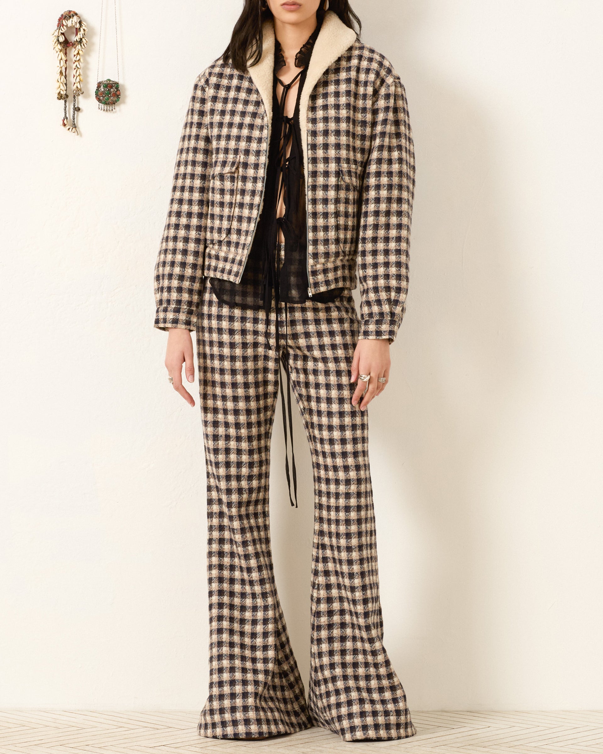 Person wearing Alix of Bohemia FW25 EliTrailDustBomberJacket and Pants