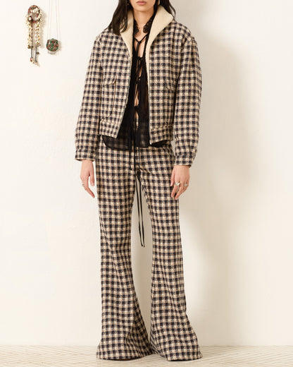 Person wearing Alix of Bohemia FW25 EliTrailDustBomberJacket and Pants