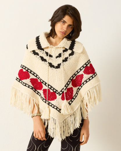 Person wearing Alix of Bohemia Faune Heart Knit Poncho