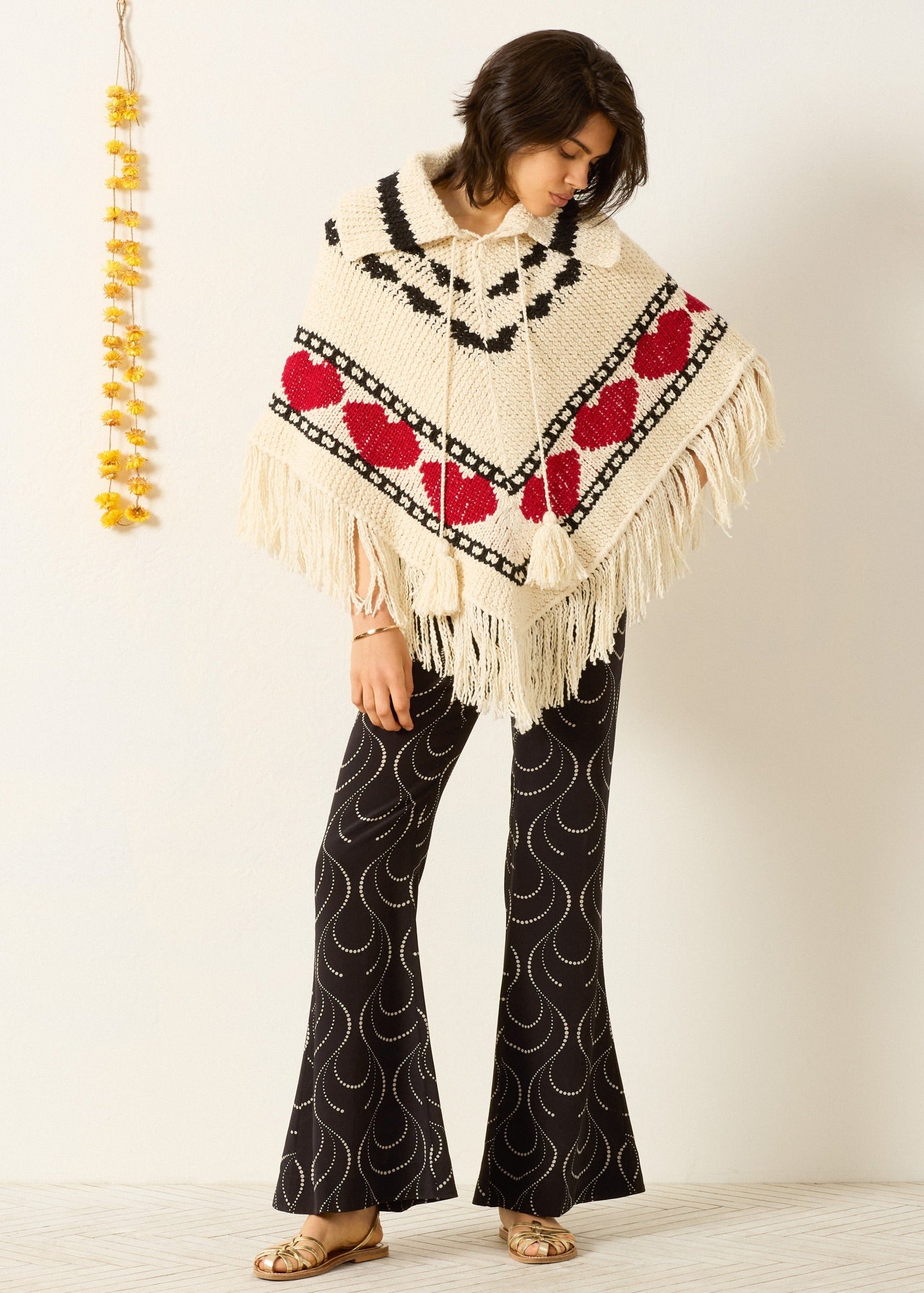 Person wearing Alix of Bohemia Faune Heart Knit Poncho