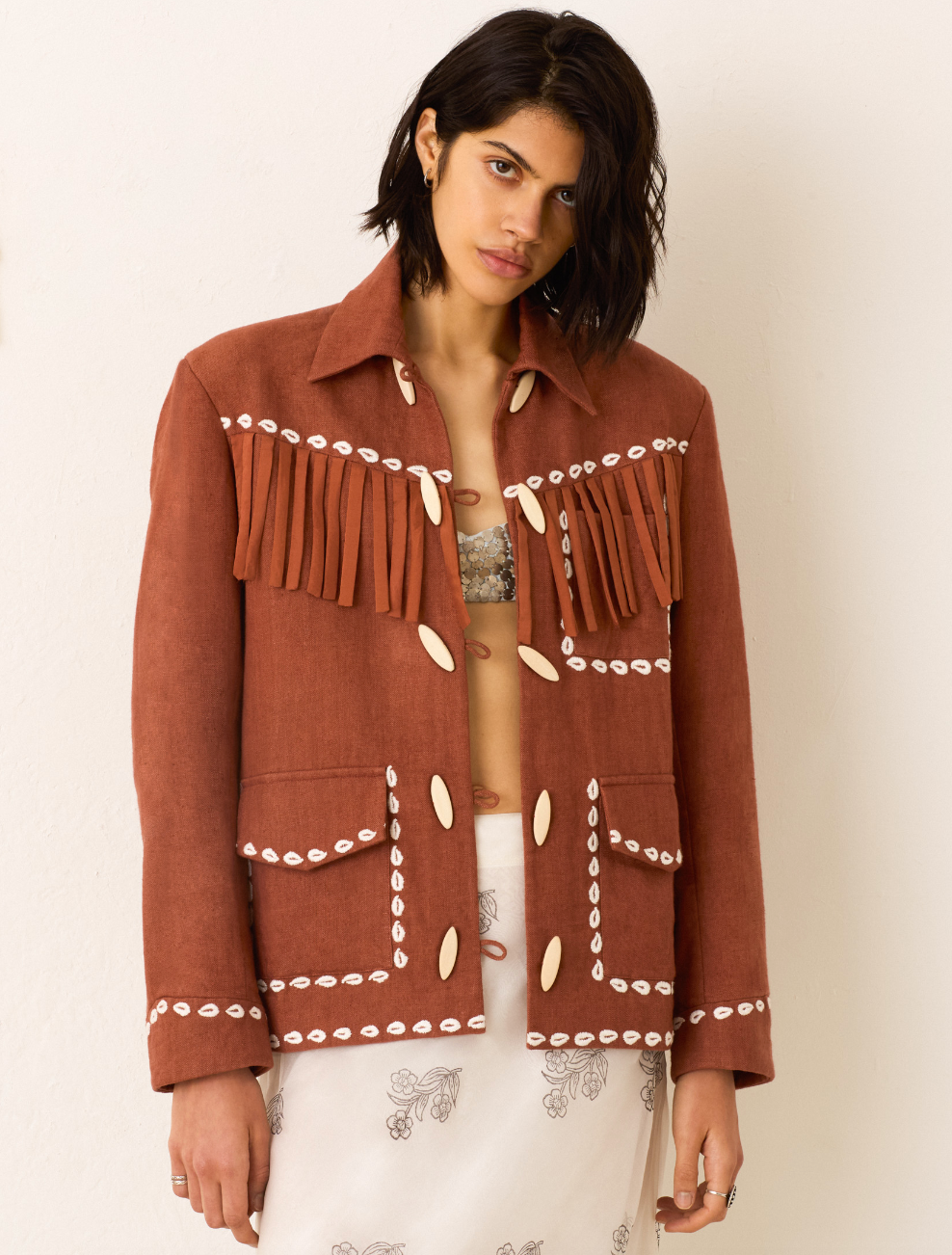 Person wearing Alix of Bohemia Jude Redwood Cowrie Jacket