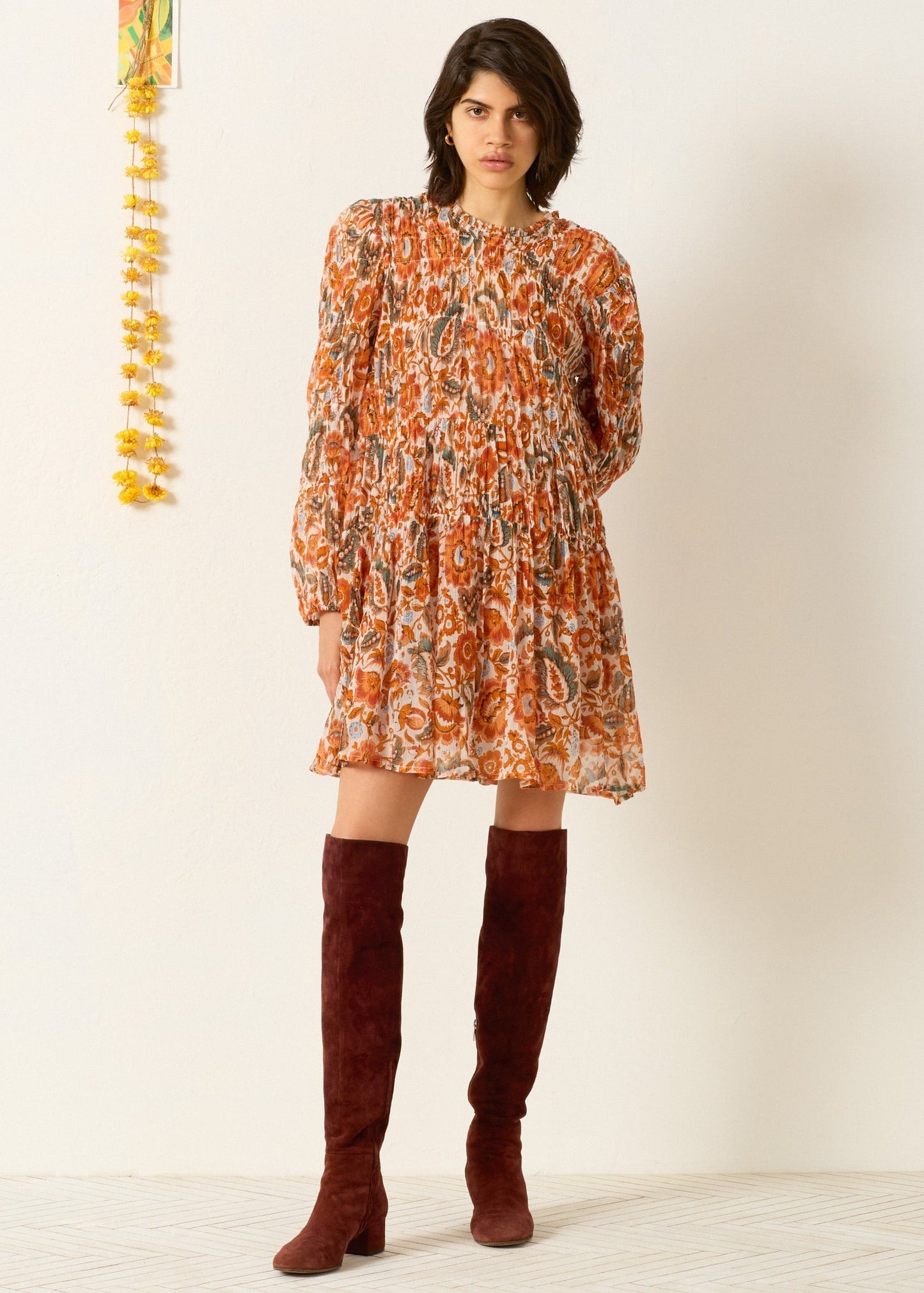 Person wearing Alix of Bohemia Juno Topaz Flower Dress