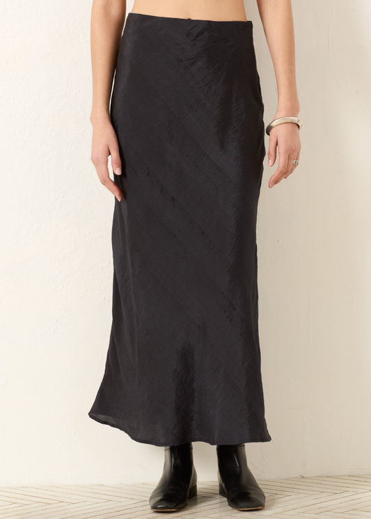 Person wearing Alix of Bohemia Lyra Onyx Silk Skirt