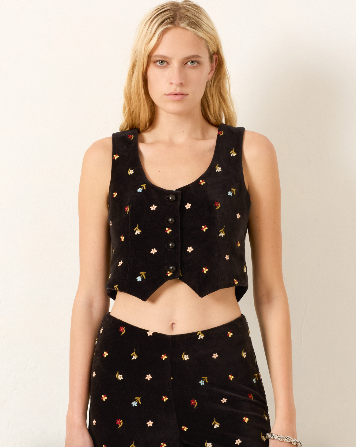 Person wearing Alix of Bohemia Mossie Onyx Bouquet Top