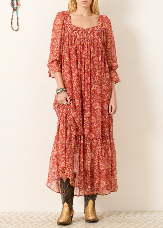 Person wearing Alix of Bohemia womens FW25-LIL015-DLiliumSunsetEmberDress_2349