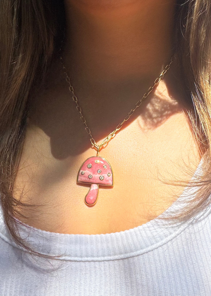 person wearing BRENT NEALE fine jewelry 18k yellow gold Large Magic Mushroom Pendant with Rhodochrosite and Diamonds