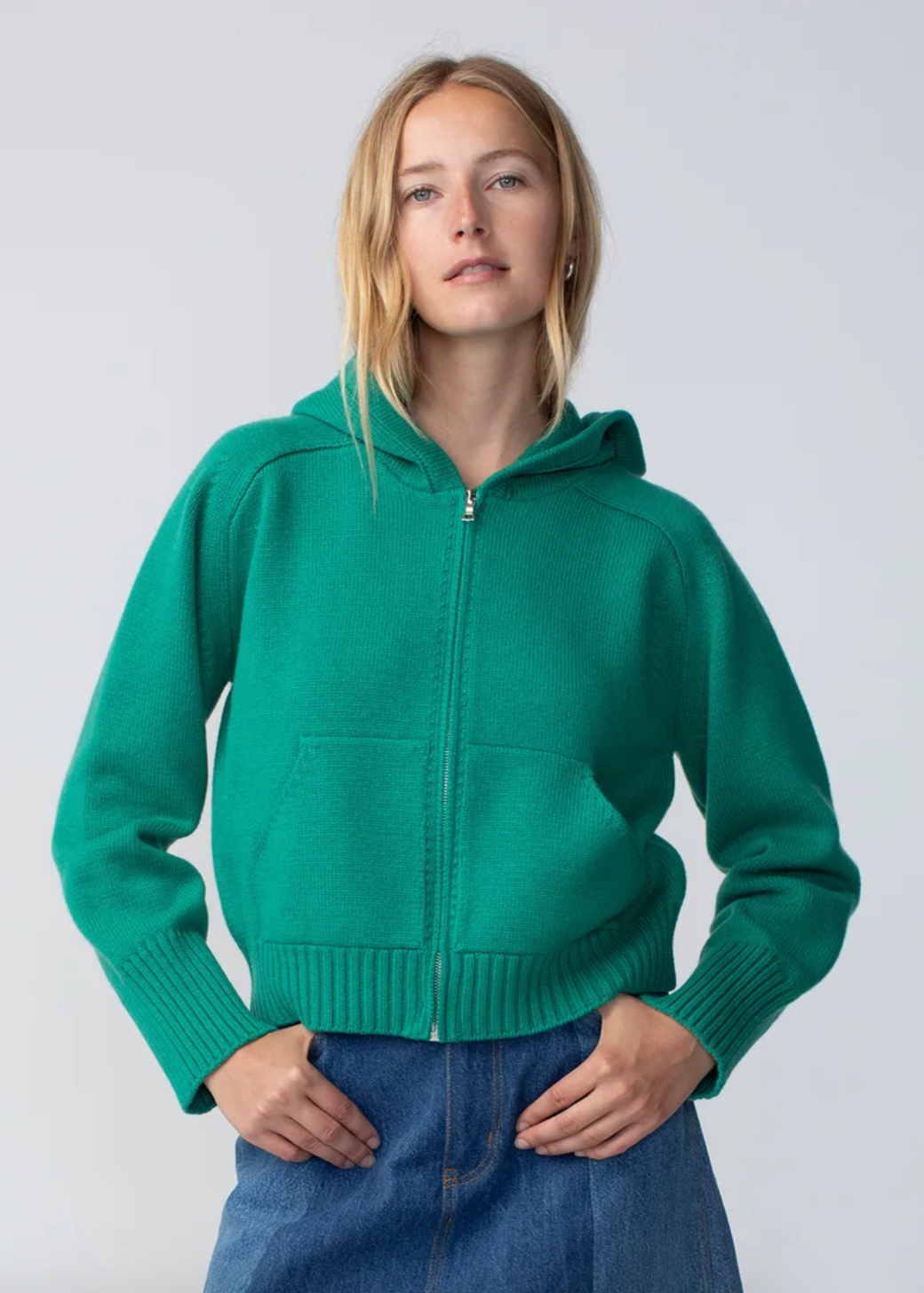 Person wearing Calle del Mar Cashmere Zip Up Hoodie in Green