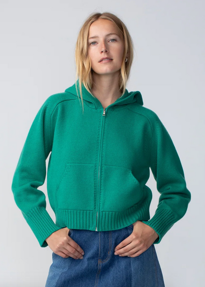Person wearing Calle del Mar Cashmere Zip Up Hoodie in Green
