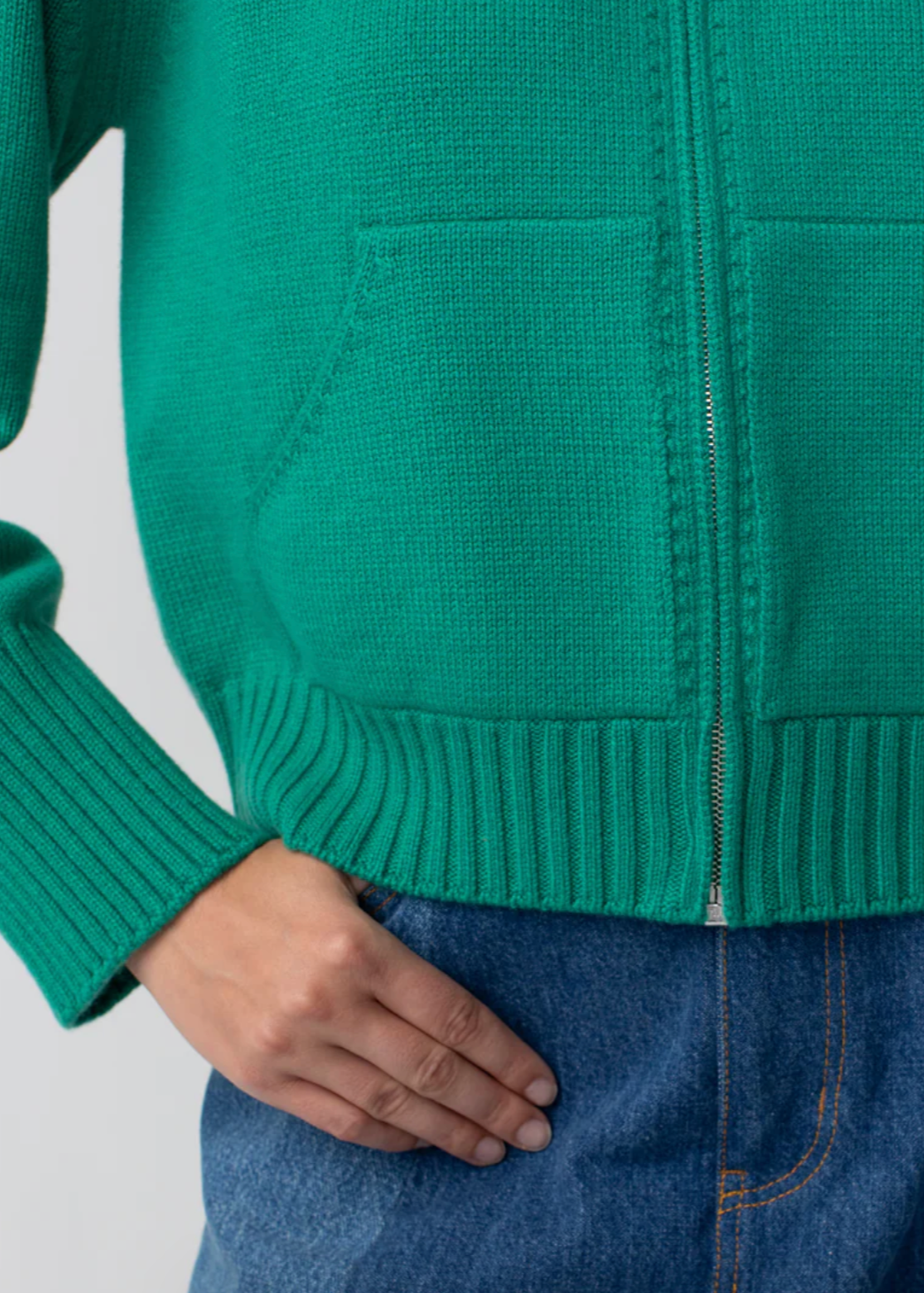 Person wearing Calle del Mar Cashmere Zip Up Hoodie in Green