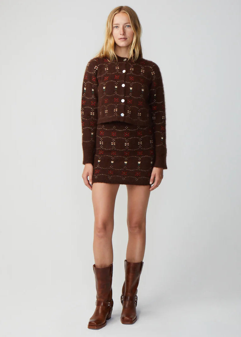 Person wearing Calle del Mar Western Fair Isle Cashmere Cardigan and Skirt Chocolate brown