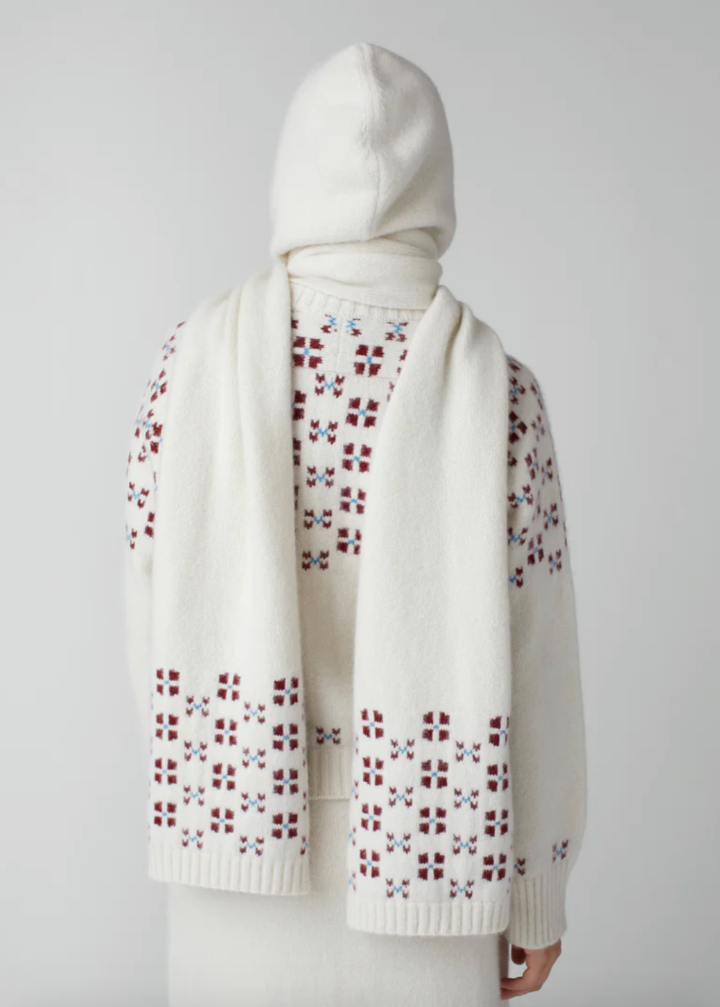 Person wearing Calle del Mar Winter Fair Isle Hoodie Scarf