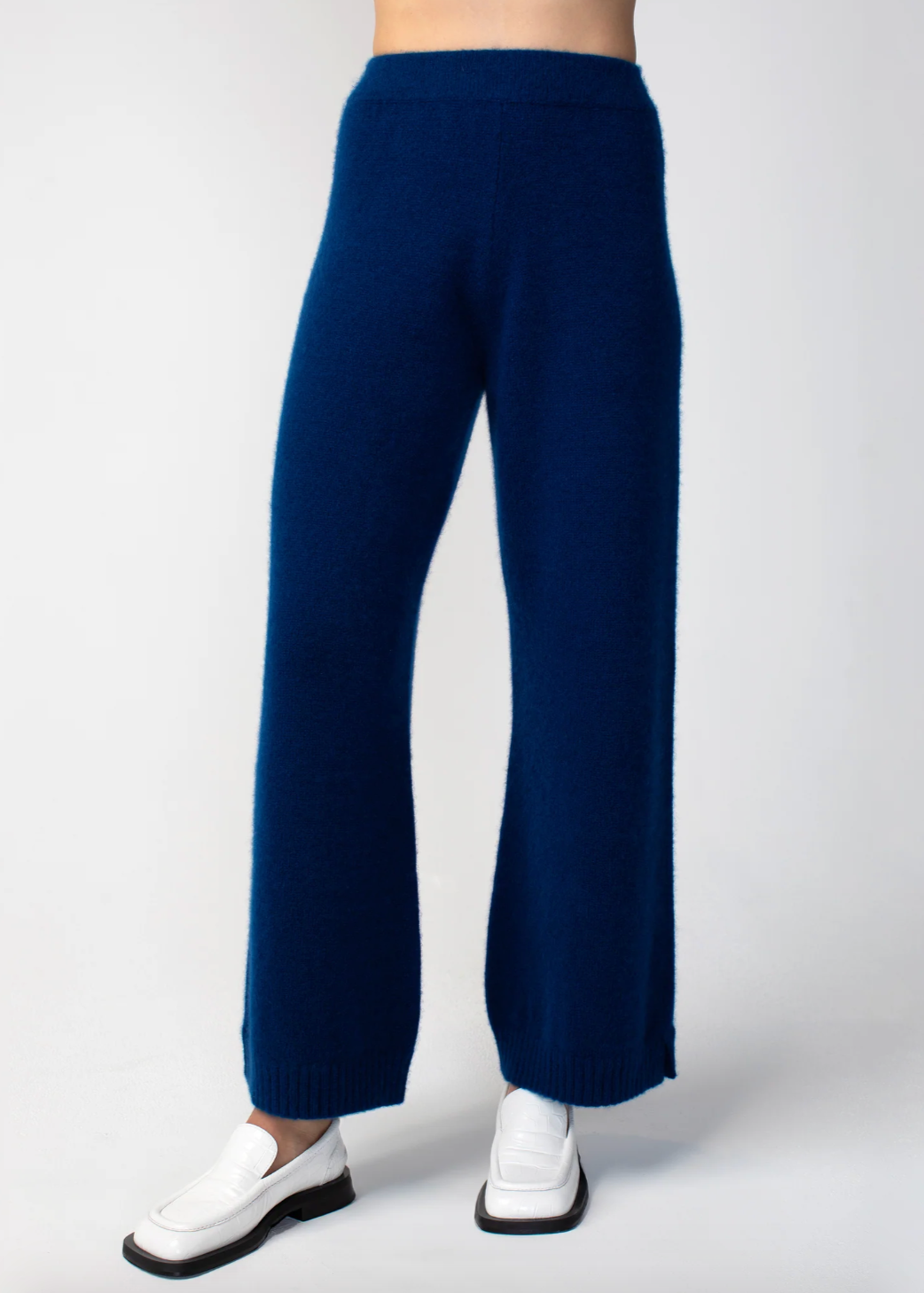 Person wearing Calle del Mar womens Cashmere Pants in Navy Blue