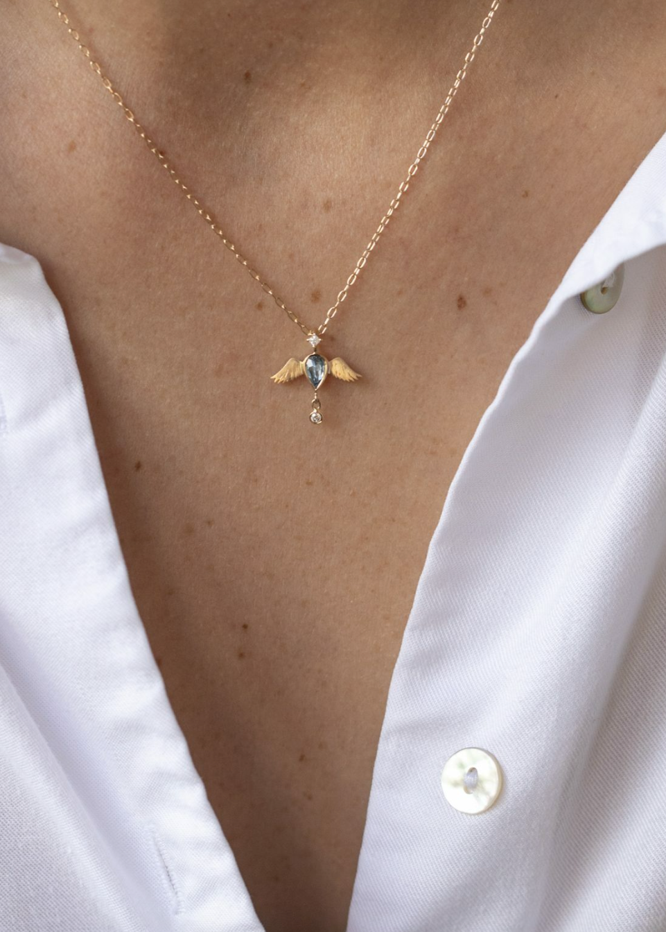 Person wearing Celine Daoust 14k yellow gold 18 inch Aquamarine Pear and Diamonds Angel Necklace