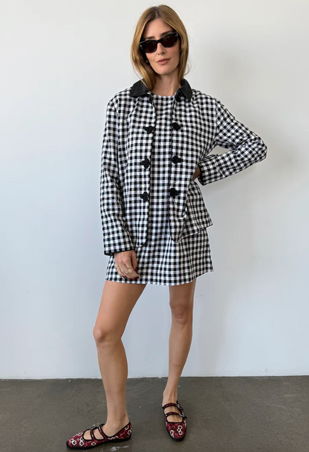 Person wearing Ciao Lucia Anja Gingham Jacket