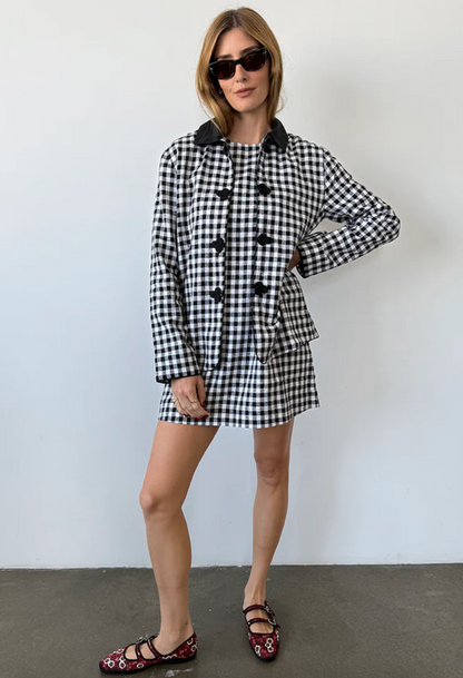 Person wearing Ciao Lucia Anja Gingham Jacket
