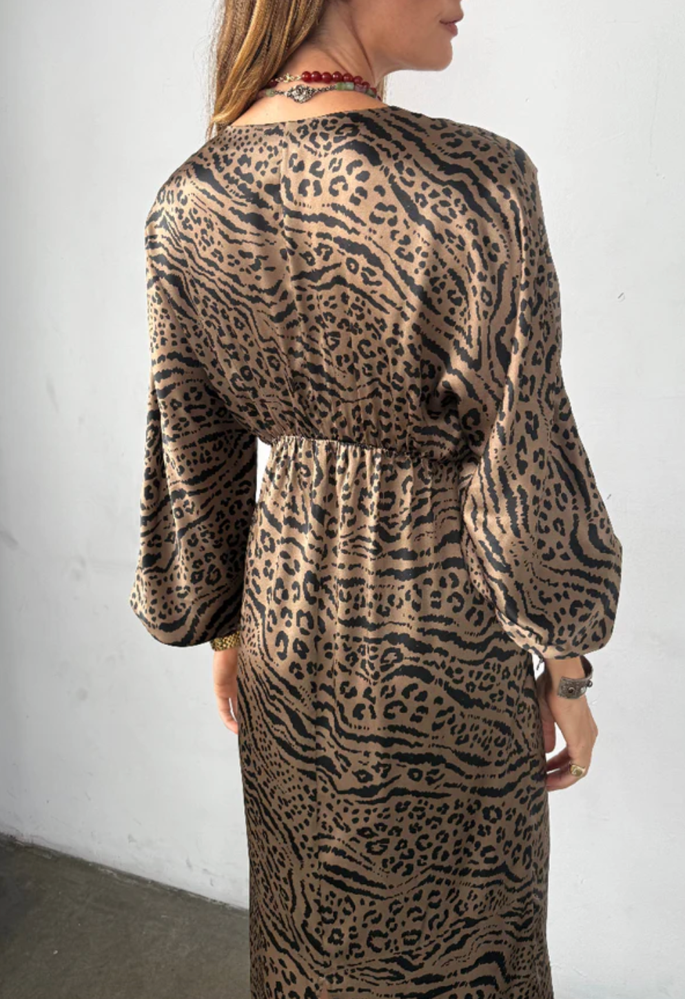 Person wearing Ciao Lucia Asta Dress in Leopard Silk