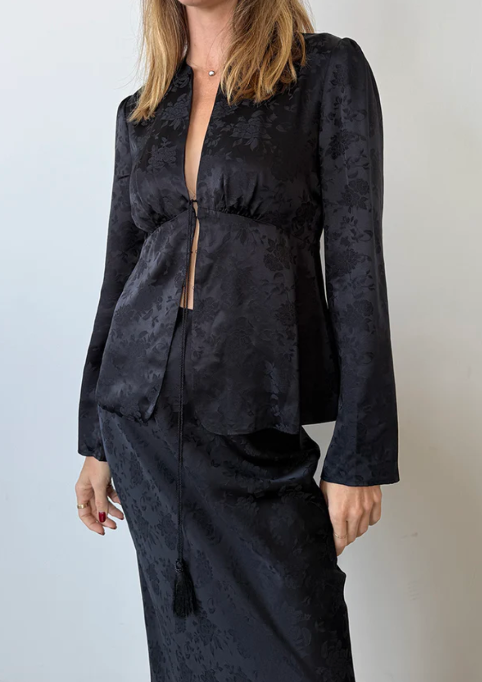 Person wearing Ciao Lucia Jorgina Jacquard Silk Top Black