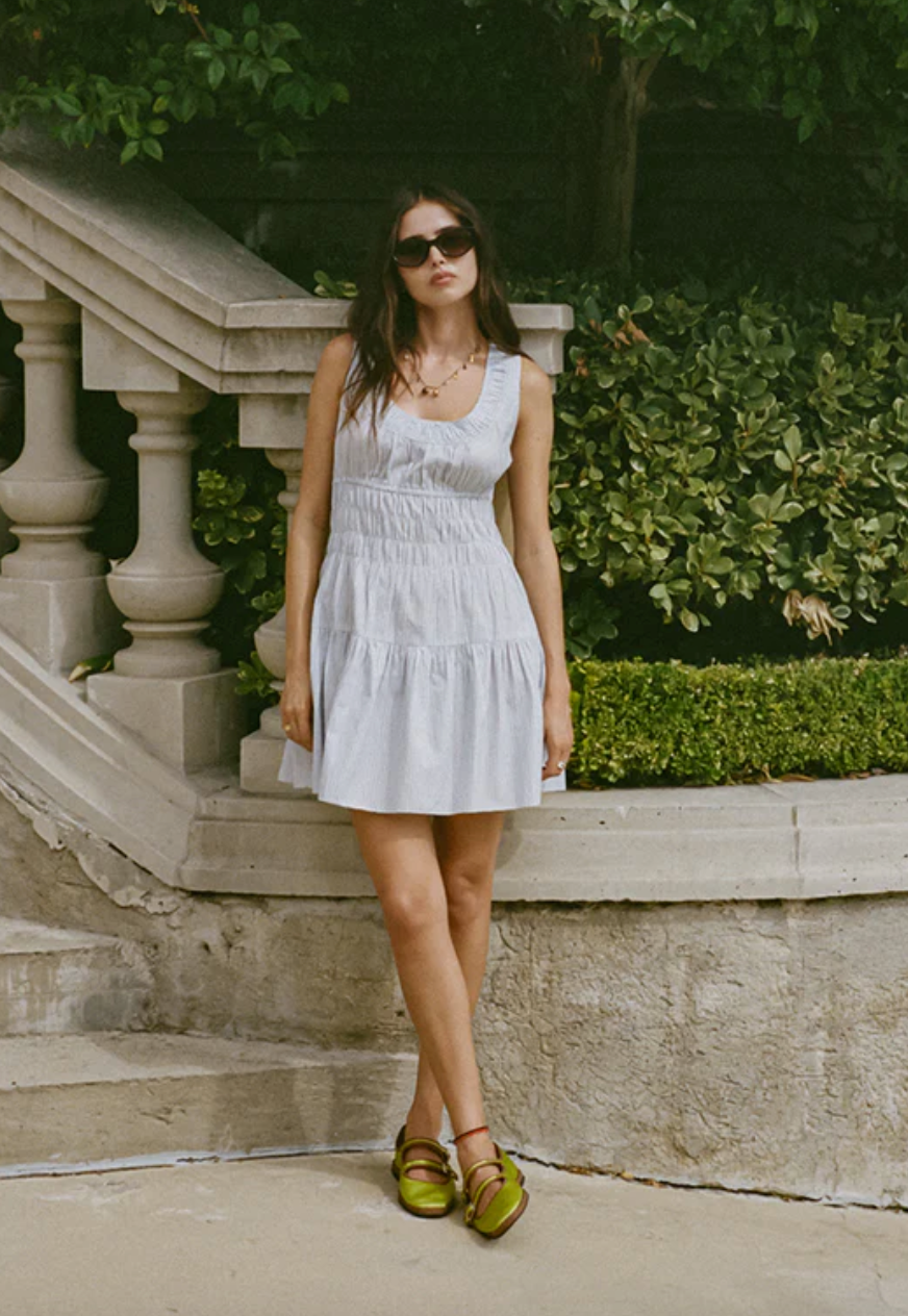 Person wearing Ciao Lucia Kala Stripe Cotton Dress