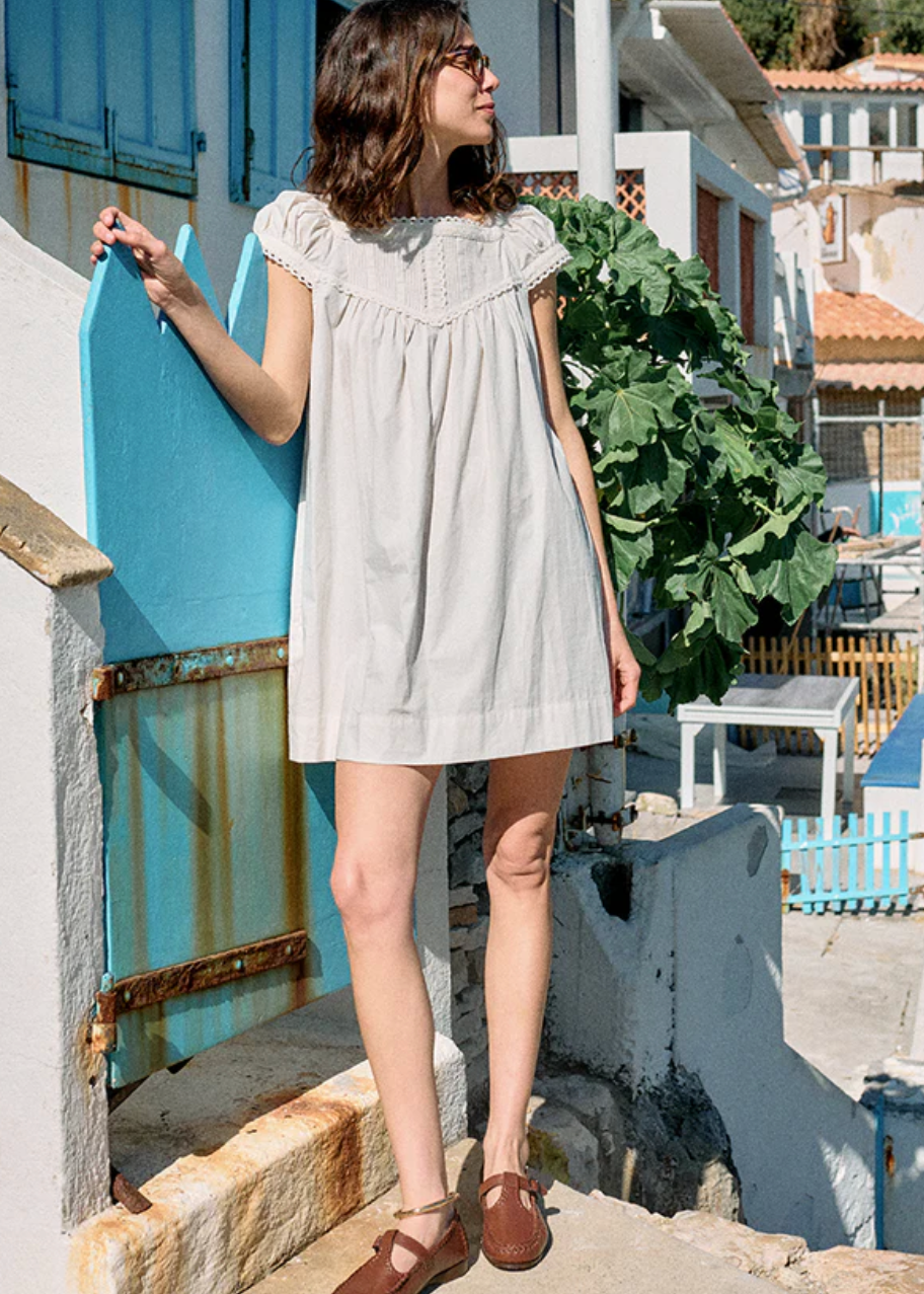 Person wearing Ciao Lucia Women's Brynn Cotton Poplin Dress in Ivory