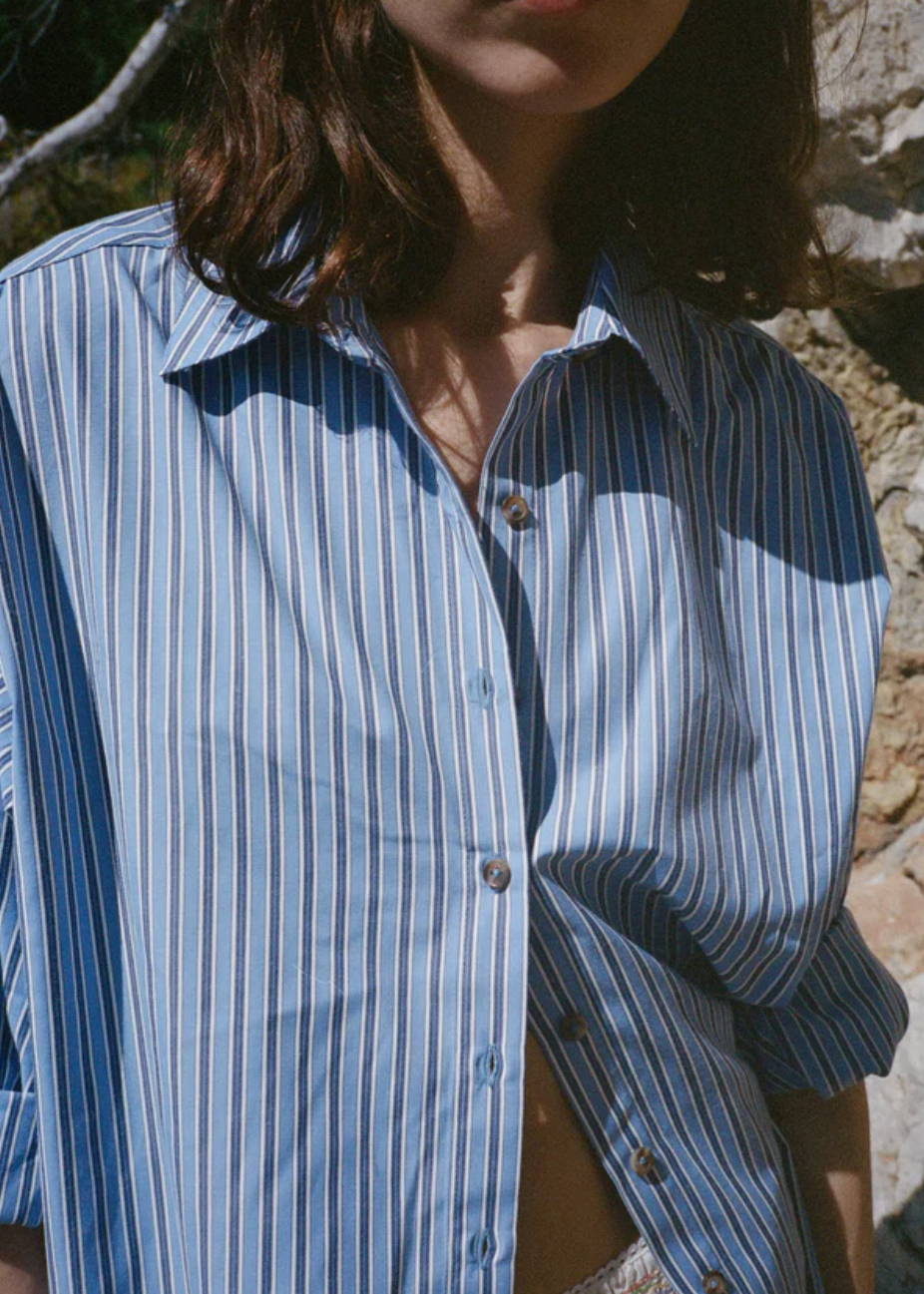 person wearing Ciao Lucia Women's Indra Shirting Shirt in Stripe