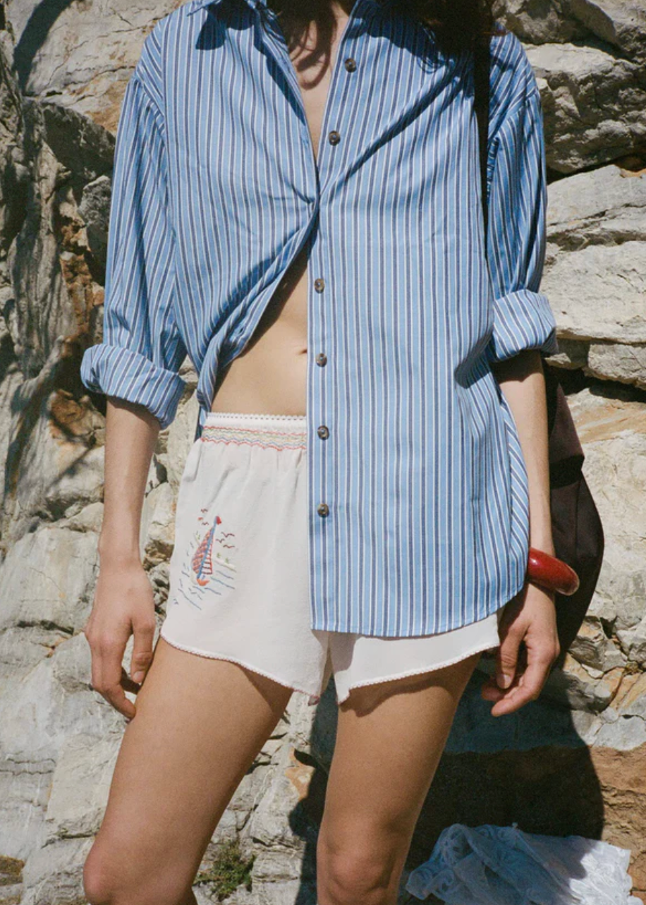 Person wearing Ciao Lucia Women's Indra Shirting Shirt in Stripe
