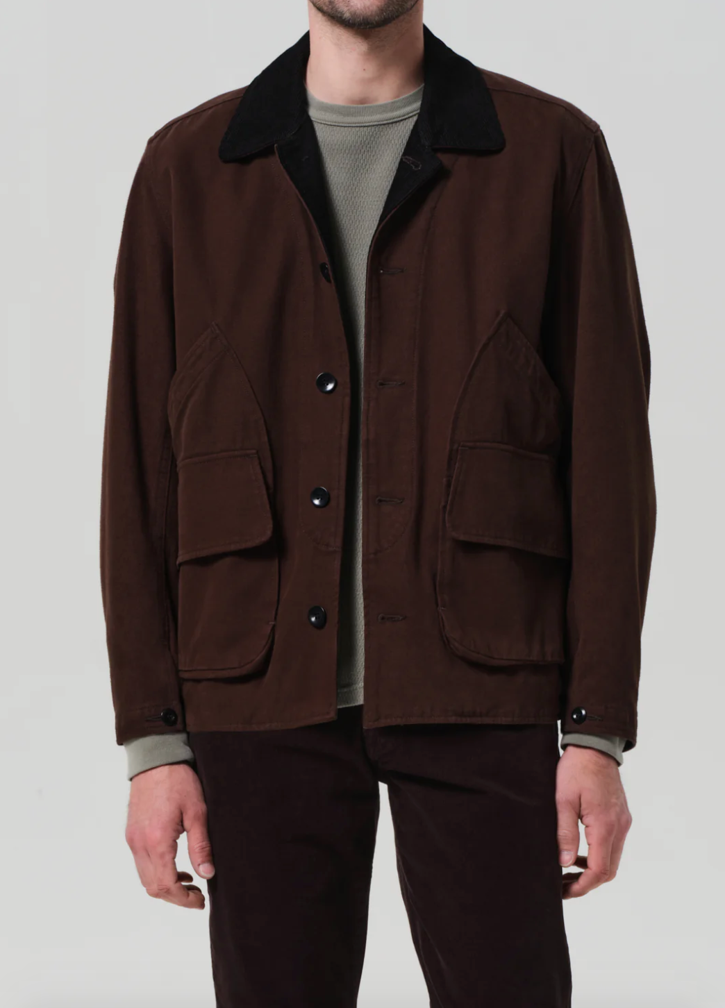Person wearing Citizens of Humanity Men's Hunter Jacket in Dark Brown