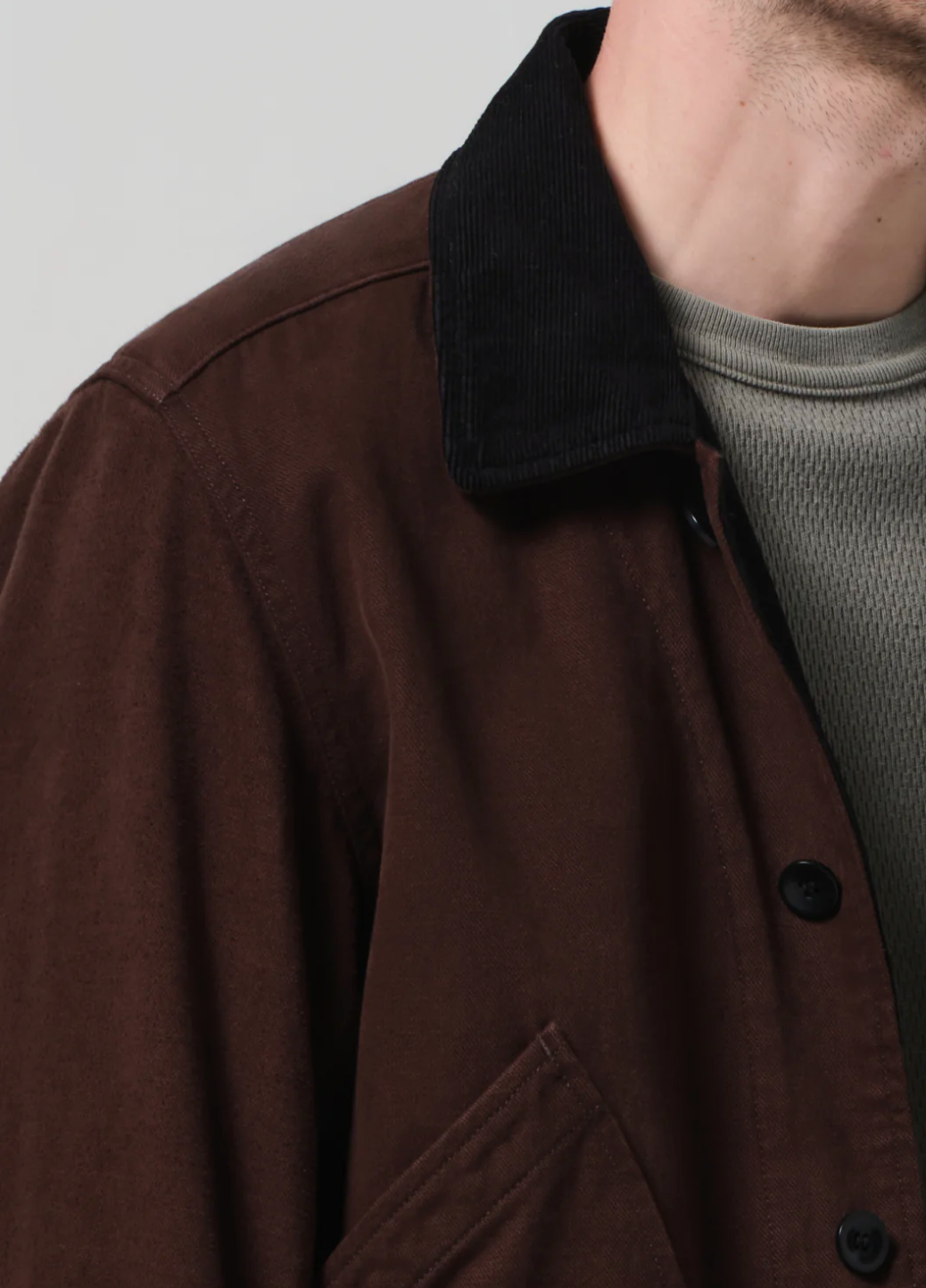 Person wearing Citizens of Humanity Men's Hunter Jacket in Dark Brown