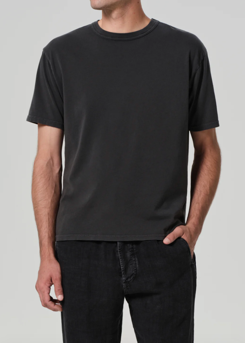 Person wearing Citizens of Humanity Mens Cotton Box Tee in Charred Cedar