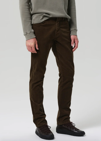 Person wearing Citizens of Humanity The Gage Stretch Cord in Vetiver