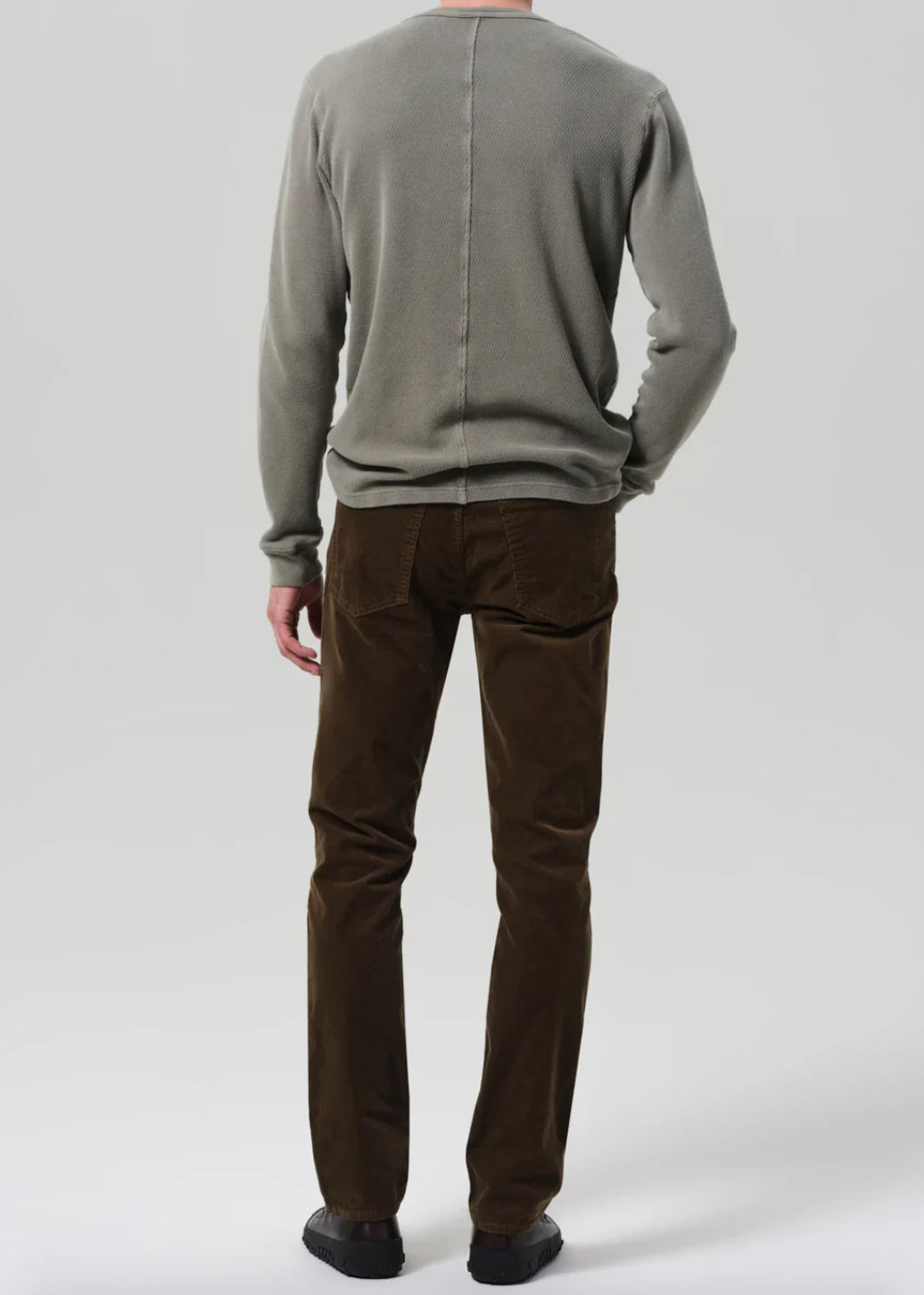 Person wearing Citizens of Humanity The Gage Stretch Cord in Vetiver