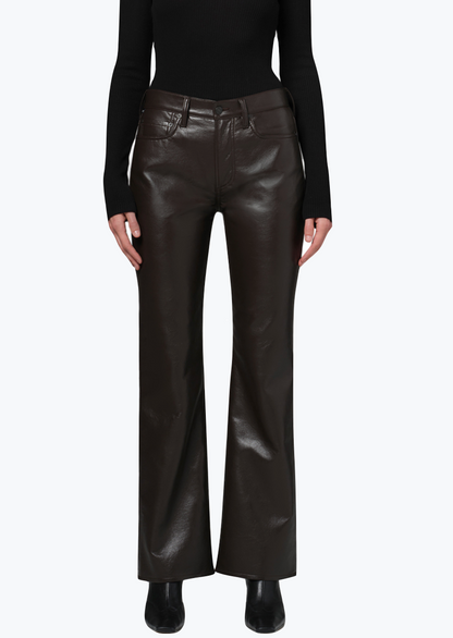 Person wearing Citizens of Humanity womens Genova Low Rise Bootcut in Chocolate leather pants