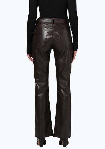 Person wearing Citizens of Humanity womens Genova Low Rise Bootcut in Chocolate leather pants