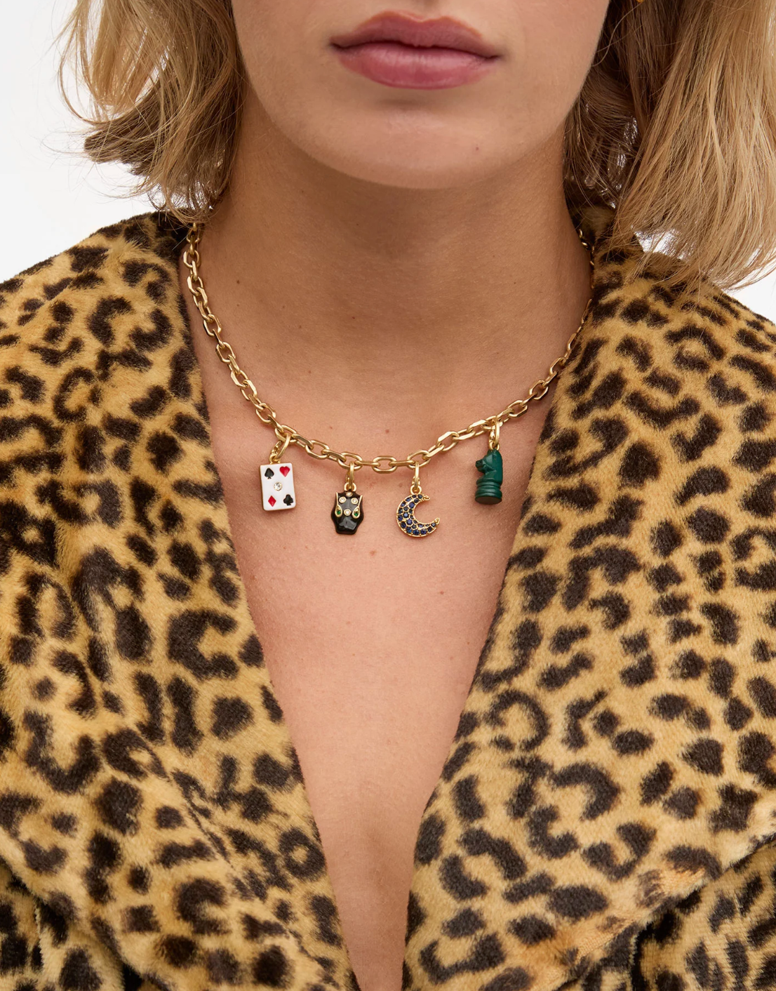 Person wearing Clare V Carte Charm necklace