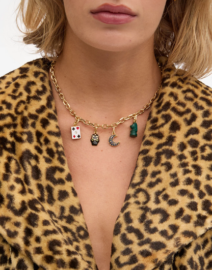 Person wearing Clare V Carte Charm necklace