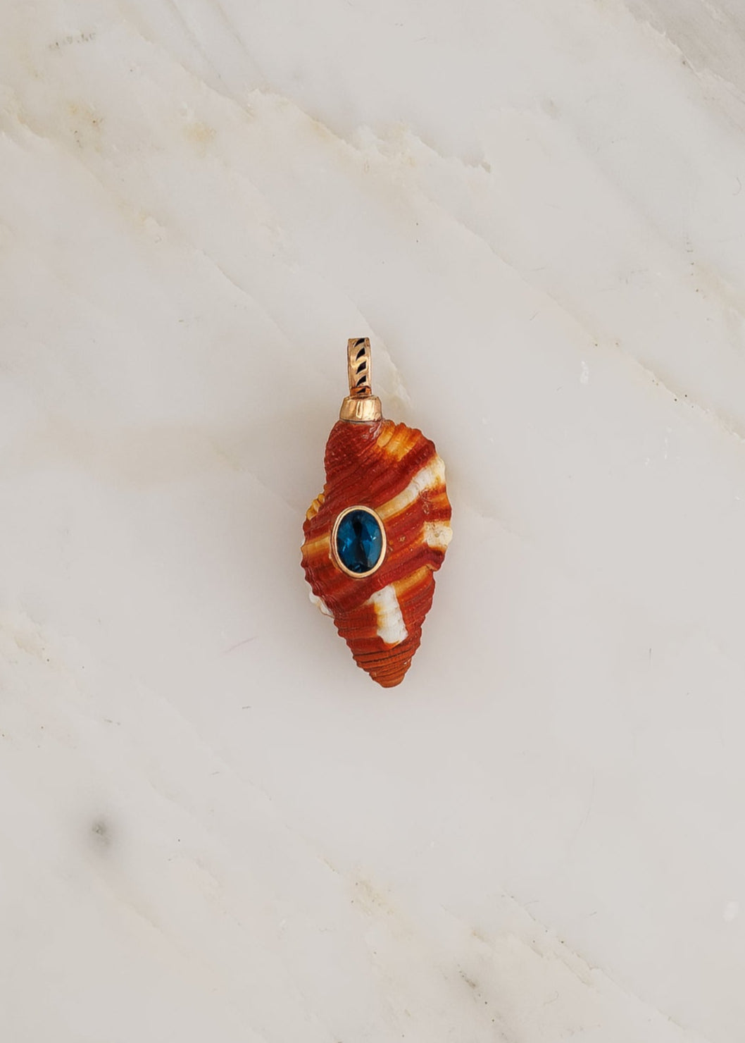 Dezso fine jewelry 18k rose gold Natural Triton Shell with Blue Zircon