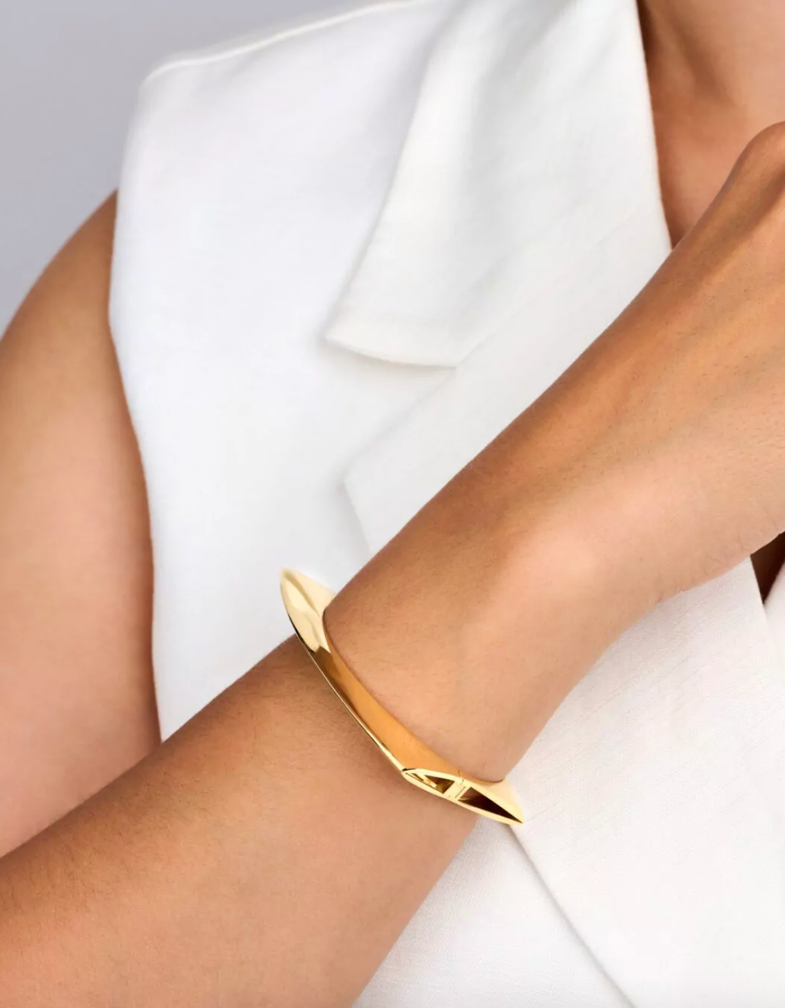 Person wearing Dries Criel 18k Yellow Gold Lotus Bracelet